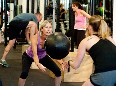 Partner medicine ball exercise from Funtensity at Telluride WOW 2018